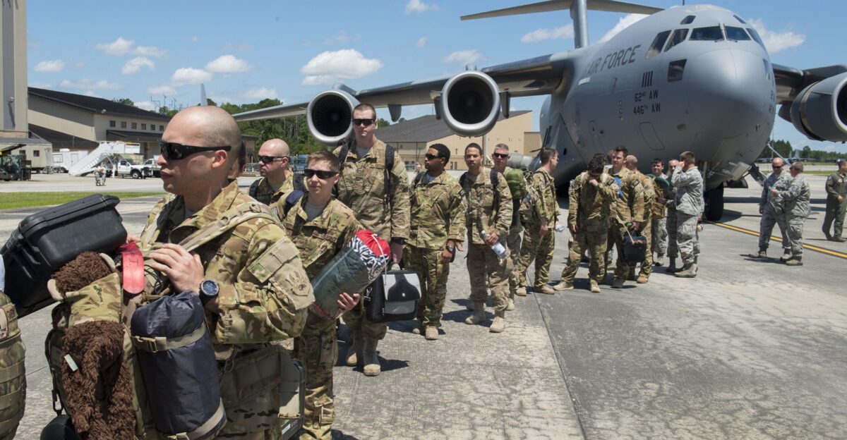 Moody Airmen file off of a C-17 Globemaster III during a deployment return at Moody Air Force Base Ga June 10 2014 The Airmen were deployed to the 455th Air Expeditionary Wing at Bagram Airfield Afghanistan for four months U S Air Force photo by Airman 1st Class Ryan Callaghan Released by Priscilla Newman