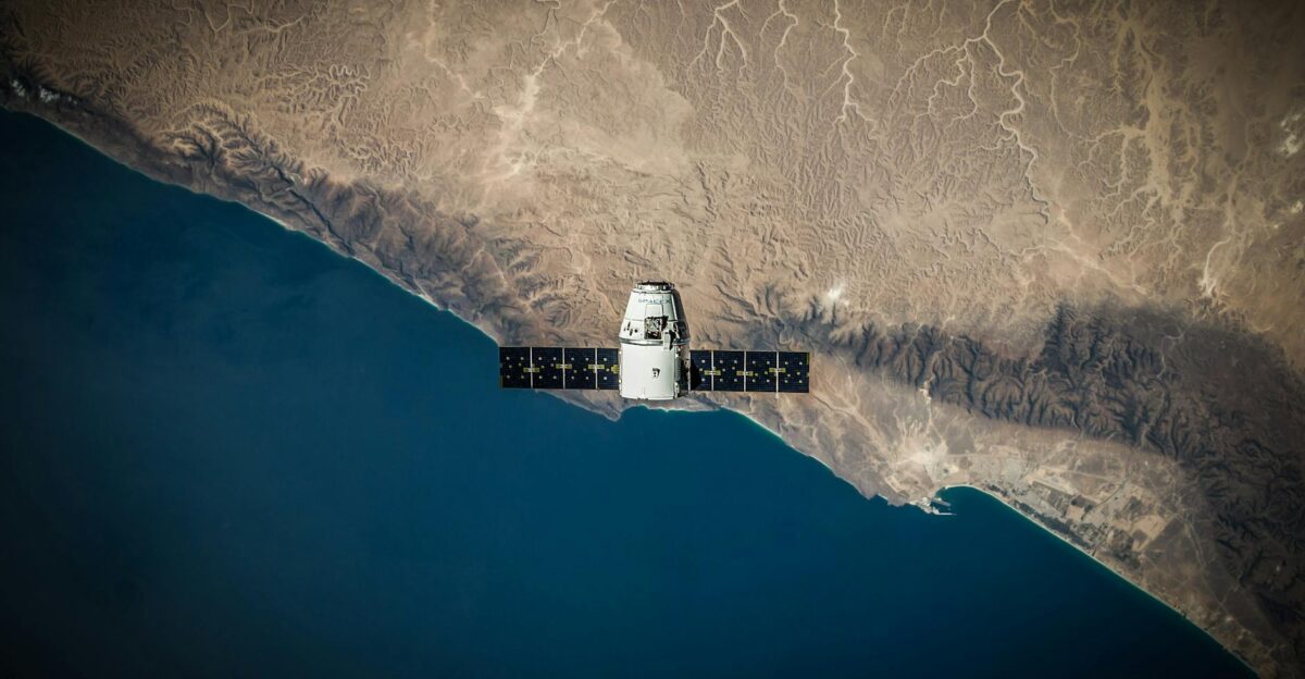 A satellite hovering above Earth s coastline captured from space