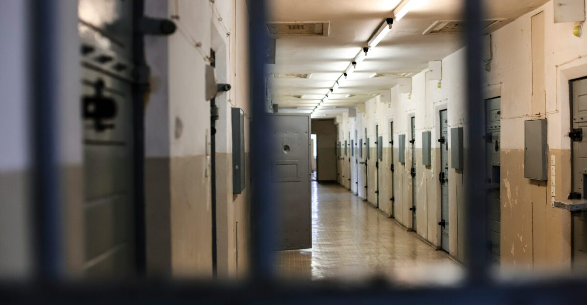 a long hallway with a bunch of lockers in it